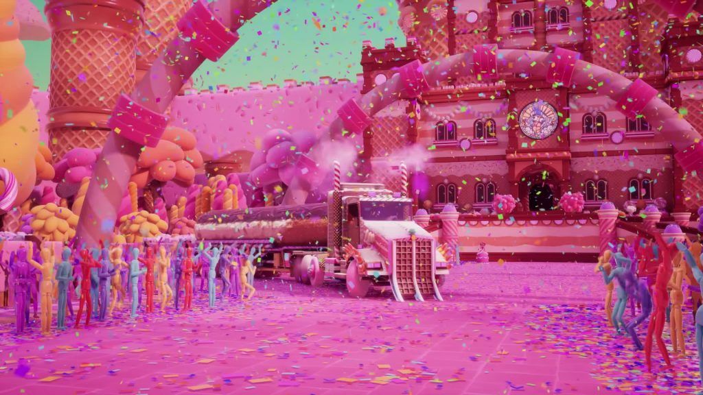 A candy truck drives through a cheering crowd at the Digital Circus celebration.