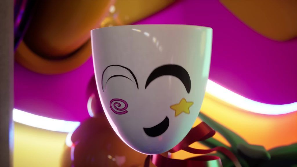 Close-up of Gangle’s smiling mask with a star and swirl design in the Digital Circus.