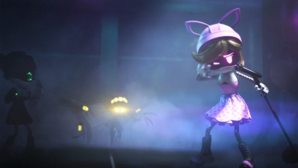 Lizzy performing on stage in a pink dress as lights and smoke fill the scene