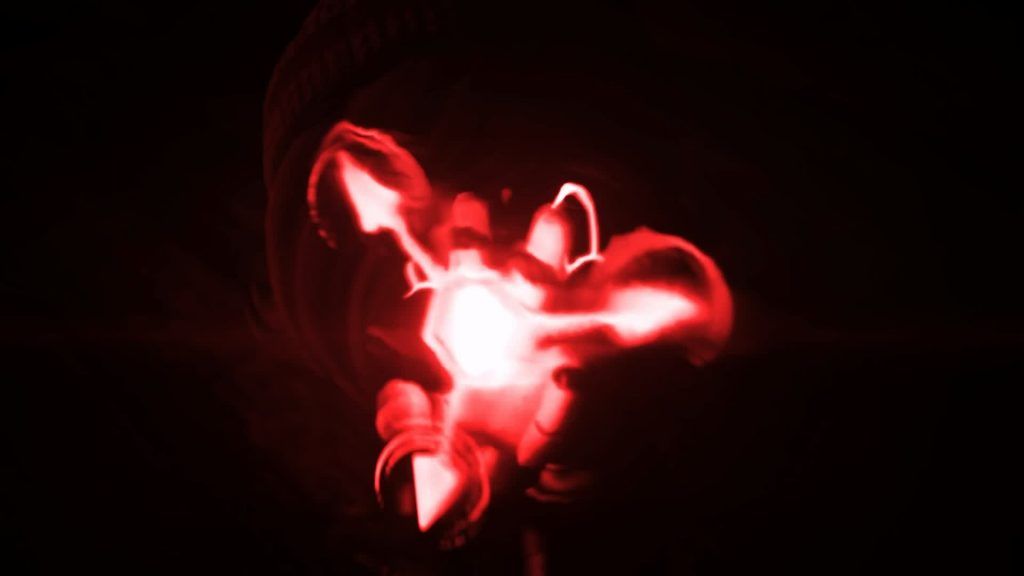 Uzi summoning red Absolute Solver energy, her hand glowing brightly in the darkness