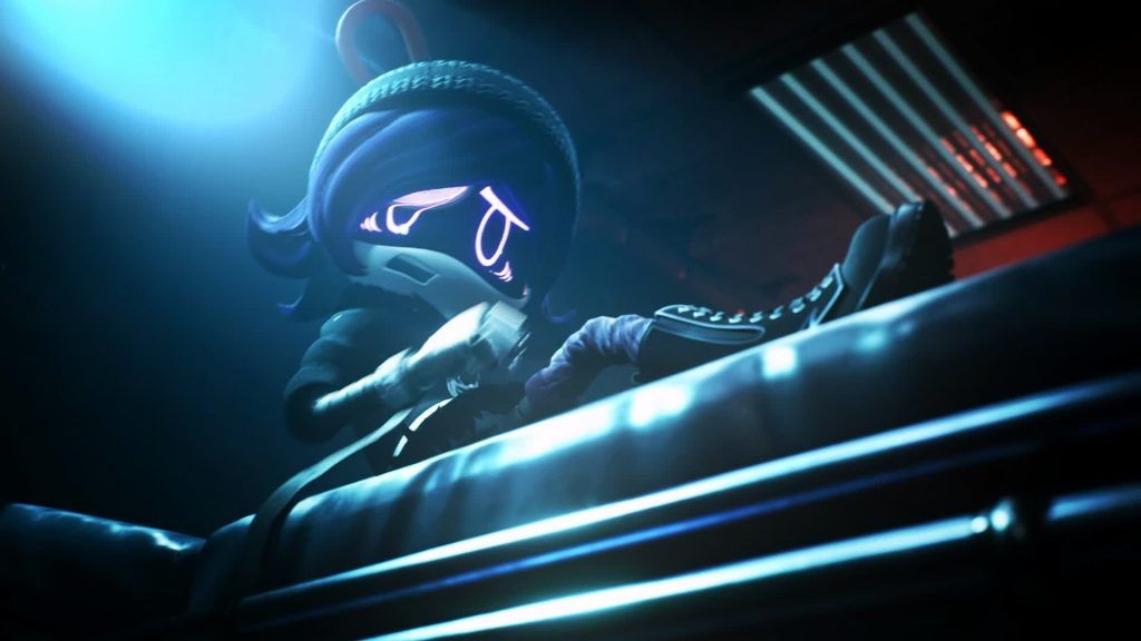 Uzi Doorman sits on a metal table under a blue light looking exhausted in Murder Drones.