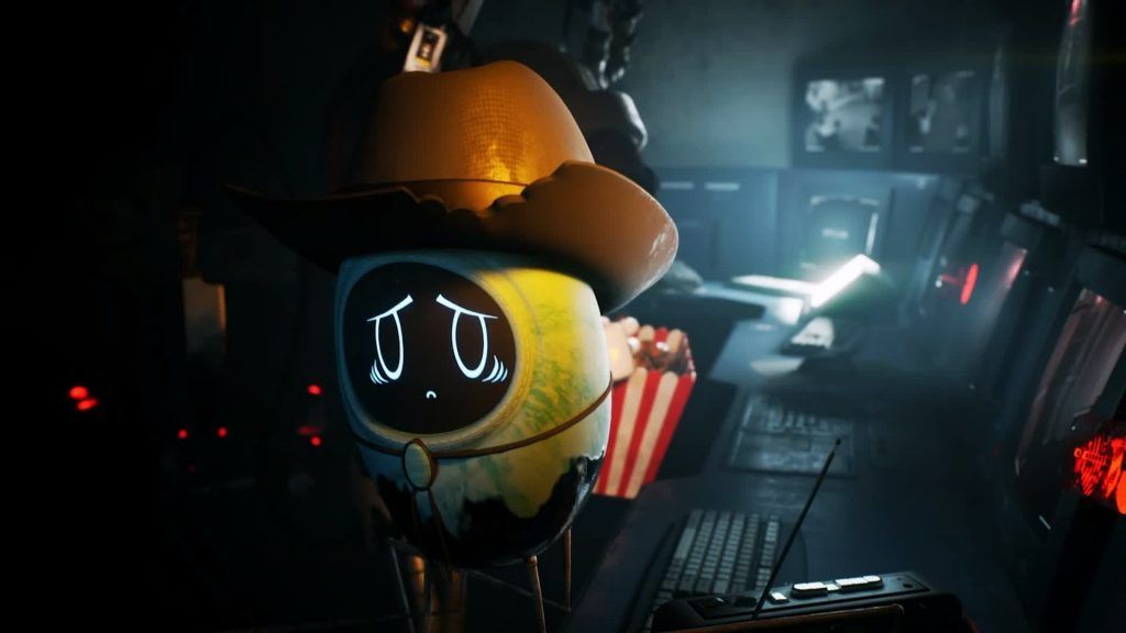 Beau wearing a cowboy hat and holding a box of popcorn in a dark surveillance room