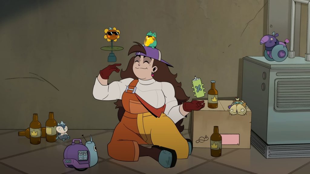 Relaxing on the floor with toy robots and bottles, balancing gadgets on her head.