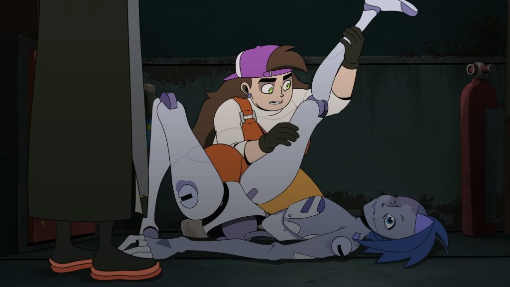 Frankie examines a damaged android lying on the floor.